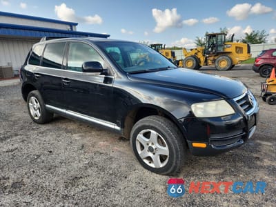 Czwarte zdjęcie samochodu z boku: 2004 VOLKSWAGEN TOUAREG 3.2 VIN:WVGBC67L24D023910 - miniatura