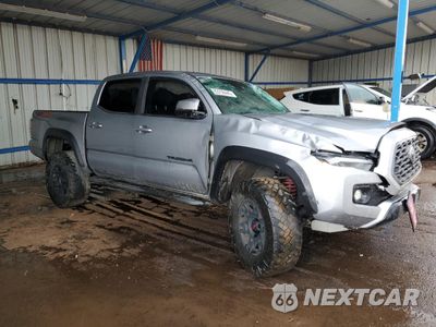 Czwarte zdjęcie samochodu z boku: 2021 TOYOTA TACOMA DOUBLE CAB VIN:3TMCZ5AN1MM407287 - miniatura