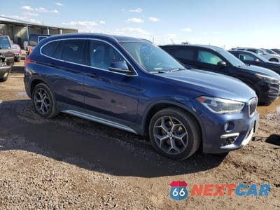 Czwarte zdjęcie samochodu z boku: 2016 BMW X1 XDRIVE28I VIN:WBXHT3C30G5E52602 - miniatura