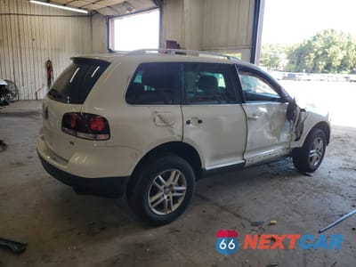 Trzecie zdjęcie samochodu z tyłu: 2009 VOLKSWAGEN TOUAREG 2 V6 VIN:WVGBE77L39D015161 - miniatura