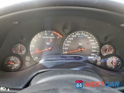 Zdjęcie 9 z 14 samochodu: 2004 CHEVROLET CORVETTE VIN:1G1YY22G745132403 - miniatura