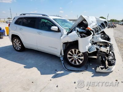 Czwarte zdjęcie samochodu z boku: 2017 JEEP CHEROKEE OVERLAND VIN:1C4PJLJS3HW617740 - miniatura