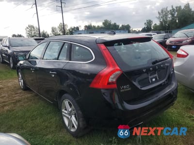 Trzecie zdjęcie samochodu z tyłu: 2015 VOLVO V60 PREMIER VIN:YV1612SK1F1243041 - miniatura