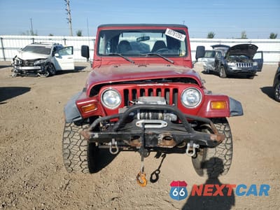 Piąte zdjęcie samochodu w środku: 1999 JEEP WRANGLER / TJ SPORT VIN:1J4FY19S8XP480961 - miniatura