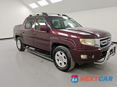 Czwarte zdjęcie samochodu z boku: 2011 HONDA RIDGELINE RTS VIN:5FPYK1F47BB006354 - miniatura