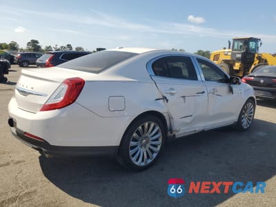 Trzecie zdjęcie samochodu z tyłu: 2016 LINCOLN MKS VIN:1LNHL9EK0GG602242 - miniatura