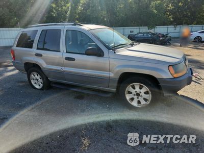 Czwarte zdjęcie samochodu z boku: 2001 JEEP GRAND CHEROKEE LAREDO VIN:1J4GX48N41C516602 - miniatura