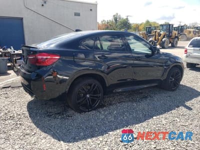 Trzecie zdjęcie samochodu z tyłu: 2018 BMW X6 M VIN:5YMKW8C51J0Y74606 - miniatura