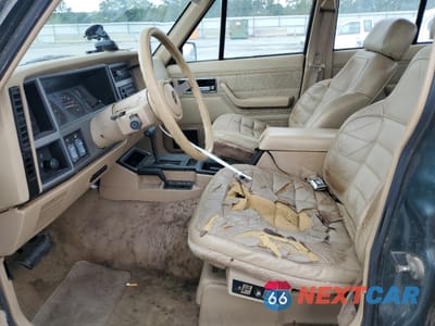 Zdjęcie 7 z 14 samochodu: 1992 JEEP CHEROKEE LAREDO VIN:1J4FJ58S5NL200771 - miniatura