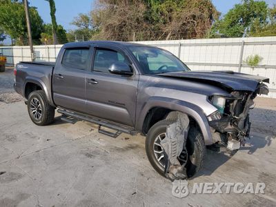 Czwarte zdjęcie samochodu z boku: 2021 TOYOTA TACOMA DOUBLE CAB VIN:5TFAZ5CNXMX110131 - miniatura