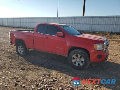 Czwarte zdjęcie samochodu z boku: 2015 GMC CANYON SLE VIN:1GTH6BEA5F1156309 - miniatura
