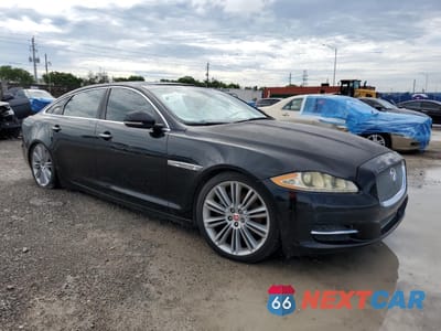 Czwarte zdjęcie samochodu z boku: 2014 JAGUAR XJL PORTFOLIO VIN:SAJWA2GZ5E8V64471 - miniatura