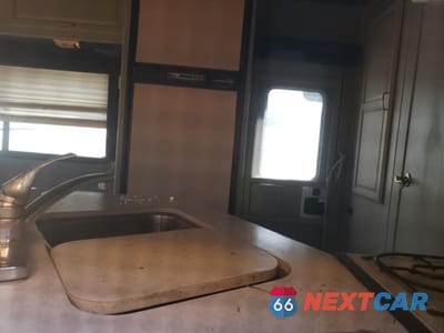 Zdjęcie 11 z 13 samochodu: 2000 WINNEBAGO MINNIE - RVS VIN:1FDWE35S6YHA10208 - miniatura