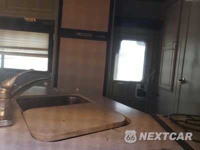 Zdjęcie 11 z 13 samochodu: 2000 WINNEBAGO MINNIE - RVS VIN:1FDWE35S6YHA10208 - miniatura