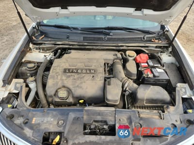 Zdjęcie 11 z 13 samochodu: 2015 LINCOLN MKS VIN:1LNHL9DK7FG602724 - miniatura