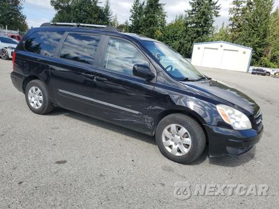 Czwarte zdjęcie samochodu z boku: 2008 HYUNDAI ENTOURAGE GLS VIN:KNDMC233286048215 - miniatura