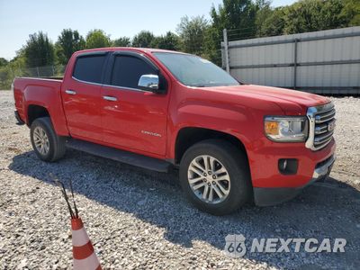Czwarte zdjęcie samochodu z boku: 2015 GMC CANYON SLT VIN:1GTG5CE36F1128718 - miniatura