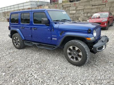 Czwarte zdjęcie samochodu z boku: 2019 JEEP WRANGLER UNLIMITED SAHARA VIN:1C4HJXEN8KW521061 - miniatura