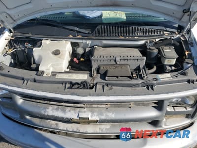 Zdjęcie 12 z 13 samochodu: 2000 CHEVROLET EXPRESS G1500 VIN:1GCEG15W9Y1211935 - miniatura