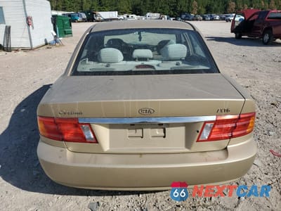 Zdjęcie 6 z 12 samochodu: 2002 KIA OPTIMA MAGENTIS VIN:KNAGD128225158631 - miniatura
