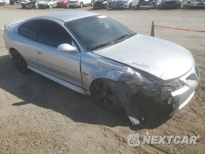 Czwarte zdjęcie samochodu z boku: 2004 PONTIAC GTO VIN:6G2VX12G44L223154 - miniatura