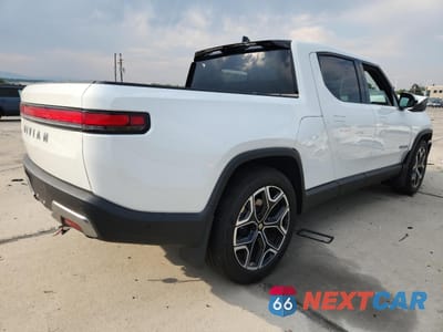 Trzecie zdjęcie samochodu z tyłu: 2025 RIVIAN R1T ADVENTURE VIN:7FCTGBAA5SN041980 - miniatura