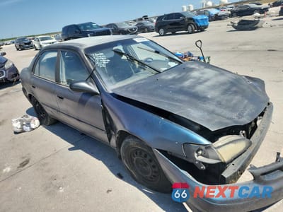 Czwarte zdjęcie samochodu z boku: 1999 TOYOTA COROLLA VE VIN:1NXBR12E4XZ298094 - miniatura