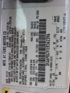 Zdjęcie 12 z 12 samochodu: 2014 FORD FUSION TITANIUM VIN:3FA6P0D91ER362396 - miniatura