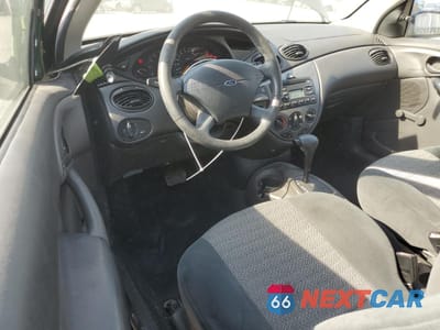 Zdjęcie 8 z 12 samochodu: 2000 FORD FOCUS ZX3 VIN:3FAFP3139YR130151 - miniatura