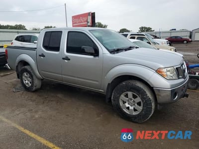 Czwarte zdjęcie samochodu z boku: 2011 NISSAN FRONTIER S VIN:1N6AD0EV2BC405286 - miniatura