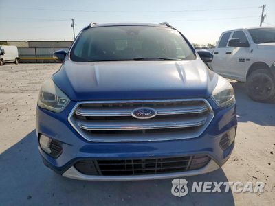 Piąte zdjęcie samochodu w środku: 2017 FORD ESCAPE TITANIUM VIN:1FMCU0JD2HUA31821 - miniatura