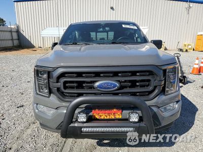 Piąte zdjęcie samochodu w środku: 2021 FORD F150 SUPERCREW VIN:1FTFW1E86MFA04943 - miniatura