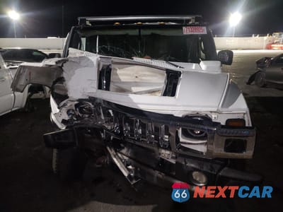 Piąte zdjęcie samochodu w środku: 2005 HUMMER H2 VIN:5GRGN23U75H126339 - miniatura