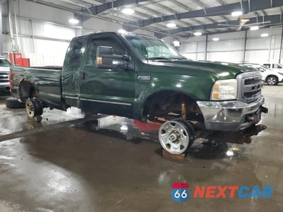 Czwarte zdjęcie samochodu z boku: 1999 FORD F250 SUPER DUTY VIN:1FTNX21S6XEE27662 - miniatura