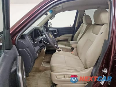Zdjęcie 7 z 14 samochodu: 2011 HONDA RIDGELINE RTS VIN:5FPYK1F47BB006354 - miniatura