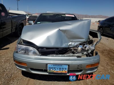 Piąte zdjęcie samochodu w środku: 1995 TOYOTA CAMRY XLE VIN:4T1SK13E4SU487985 - miniatura