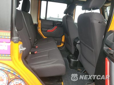 Zdjęcie 11 z 13 samochodu: 2013 JEEP WRANGLER UNLIMITED SAHARA VIN:1C4HJWEGXDL515262 - miniatura
