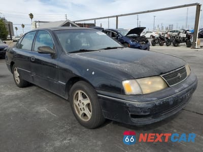 Czwarte zdjęcie samochodu z boku: 1999 TOYOTA AVALON VIN:4T1BF18B3XU329096 - miniatura