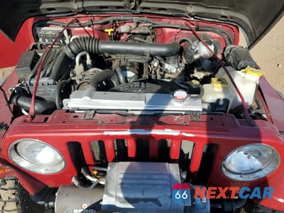 Zdjęcie 11 z 14 samochodu: 1999 JEEP WRANGLER / TJ SPORT VIN:1J4FY19S8XP480961 - miniatura