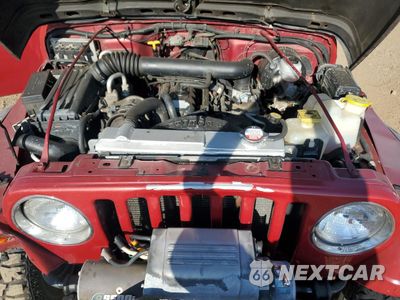 Zdjęcie 11 z 14 samochodu: 1999 JEEP WRANGLER / TJ SPORT VIN:1J4FY19S8XP480961 - miniatura