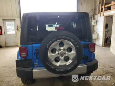 Zdjęcie 6 z 12 samochodu: 2015 JEEP WRANGLER UNLIMITED SAHARA VIN:1C4BJWEG4FL565177 - miniatura