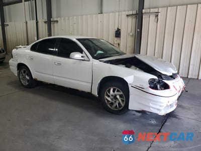 Czwarte zdjęcie samochodu z boku: 2003 PONTIAC GRAND AM SE1 VIN:1G2NF52EX3M525370 - miniatura