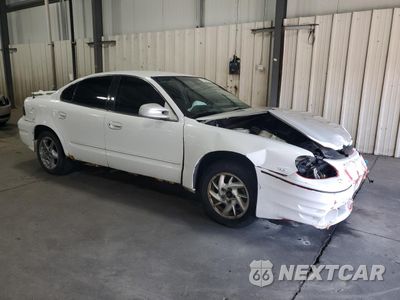 Czwarte zdjęcie samochodu z boku: 2003 PONTIAC GRAND AM SE1 VIN:1G2NF52EX3M525370 - miniatura