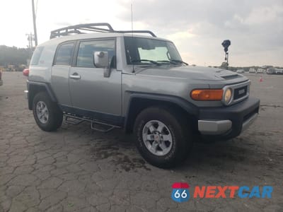Czwarte zdjęcie samochodu z boku: 2011 TOYOTA FJ CRUISER VIN:JTEZU4BF7BK011536 - miniatura