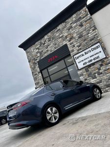 Zdjęcie 6 z 14 samochodu: 2014 KIA OPTIMA HYBRID VIN:KNAGN4AD2E5076531 - miniatura