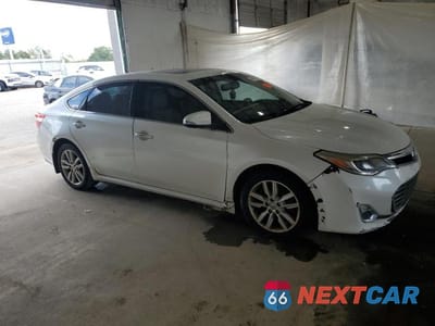 Czwarte zdjęcie samochodu z boku: 2013 TOYOTA AVALON BASE VIN:4T1BK1EB1DU068398 - miniatura
