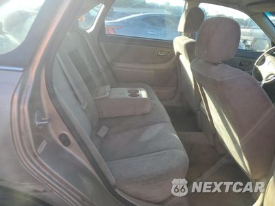 Zdjęcie 10 z 12 samochodu: 2000 TOYOTA AVALON XL VIN:4T1BF28B4YU112129 - miniatura
