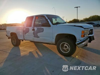 Czwarte zdjęcie samochodu z boku: 1995 GMC SIERRA C1500 VIN:1GTEC19H3SE520503 - miniatura