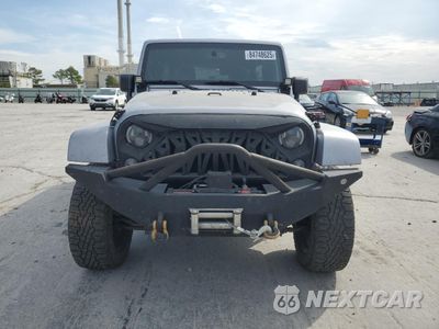Piąte zdjęcie samochodu w środku: 2015 JEEP WRANGLER UNLIMITED SAHARA VIN:1C4BJWEG6FL587830 - miniatura