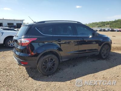Trzecie zdjęcie samochodu z tyłu: 2018 FORD ESCAPE SE VIN:1FMCU9GD3JUB75184 - miniatura